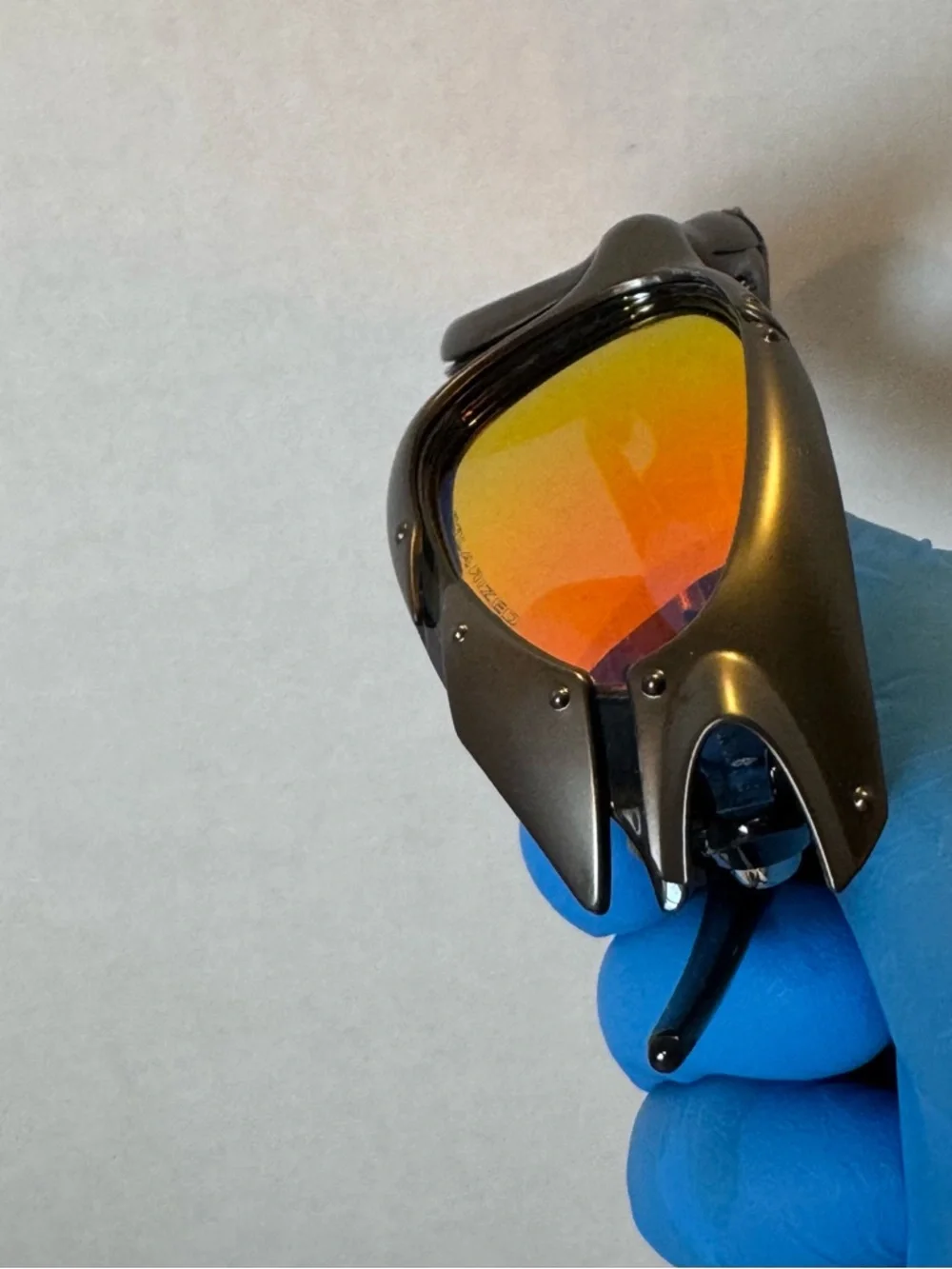 Oakley Black Sunglasses with Orange Mirror Lenses